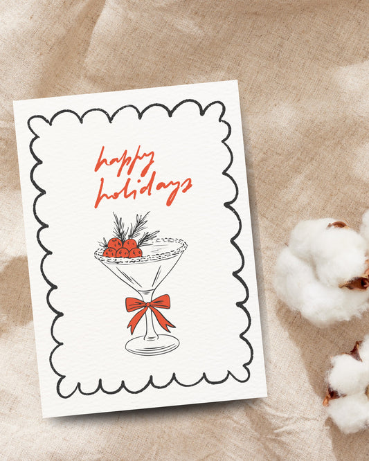 Feestdagenkaart met cocktailglas en besjes
