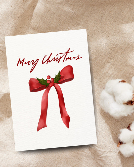 Watercolor kerstkaart met rode strik en hulst