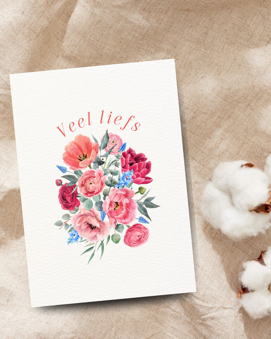 Veel liefs wenskaart met een kleurrijk aquarelboeket van roze, rode en blauwe bloemen