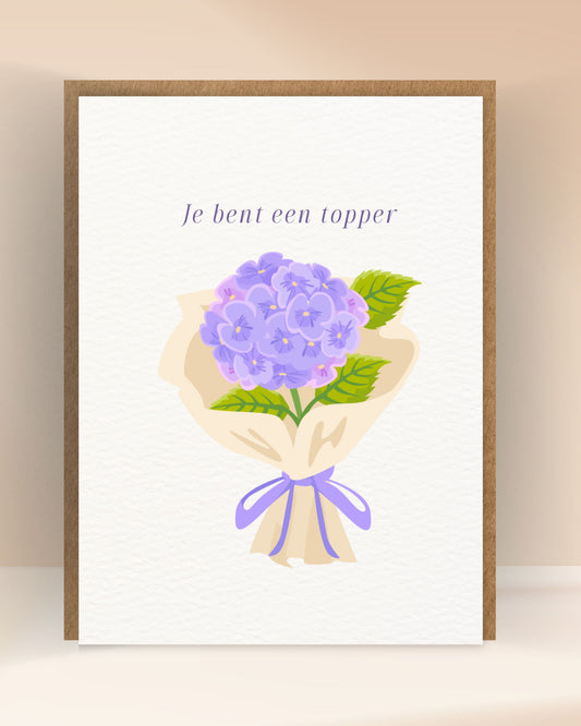 Complimentenkaart met de tekst ‘Je bent een topper’ en een paars hortensiaboeket