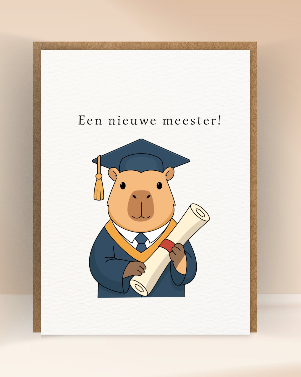 Afstudeerkaart met de tekst ‘Een nieuwe meester!’ en een capibara in toga met diploma