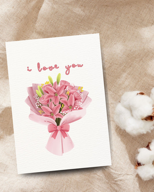 Romantische ‘I love you’-kaart met een roze boeket van lelies en rozen