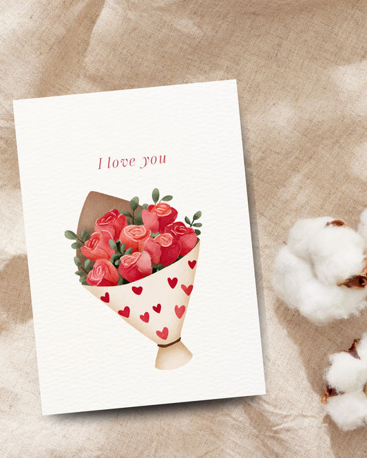 Romantische ‘I love you’-kaart met een boeket rode rozen en rode hartjes